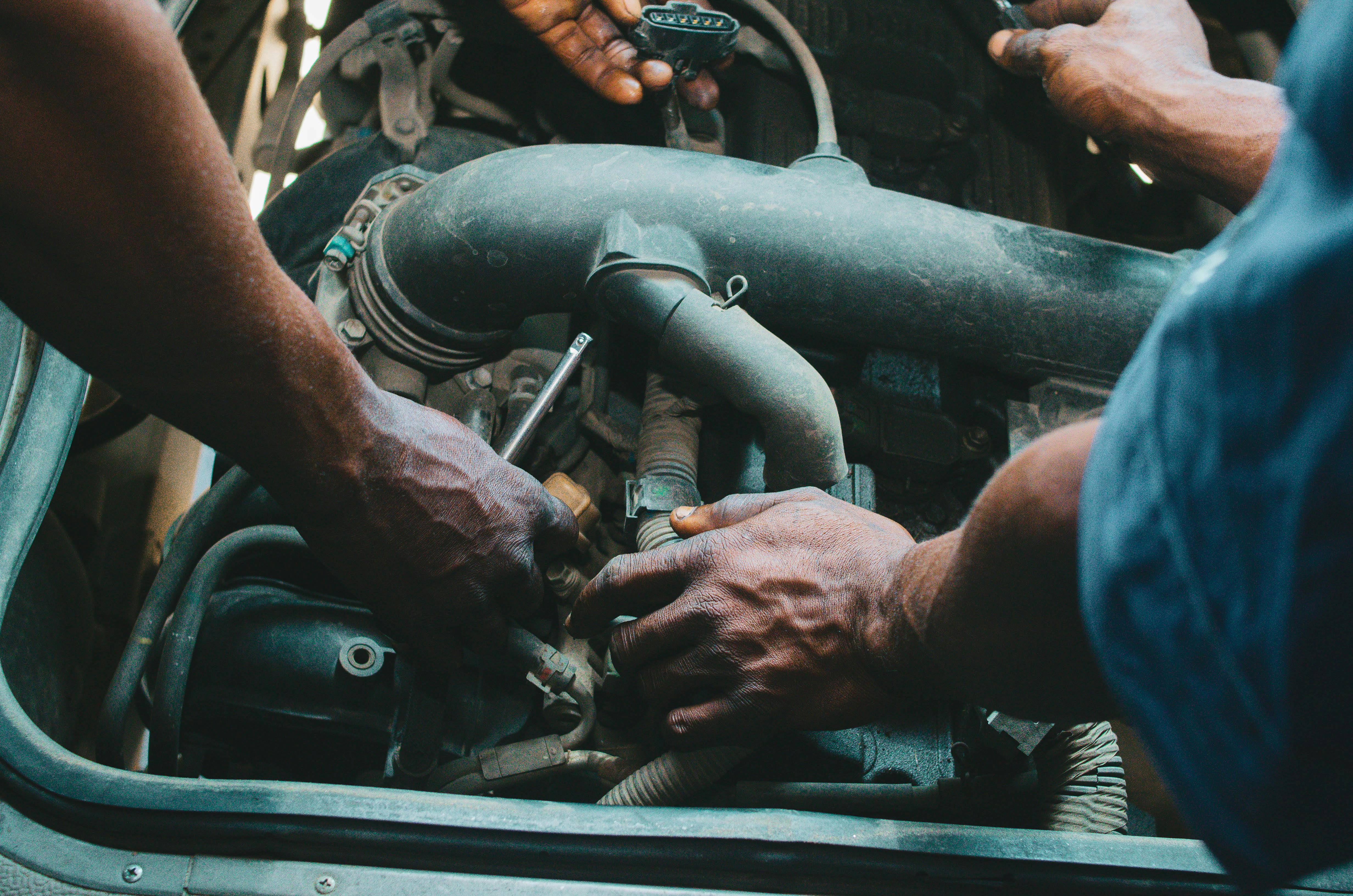 Mechanic inspecting an engine